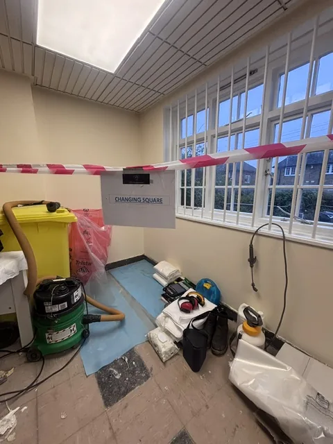 Asbestos floor tile and bitumen removal in Holland Park